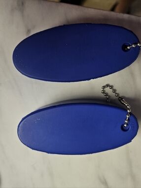 Set Of Two Blue Oval Floating Keychains